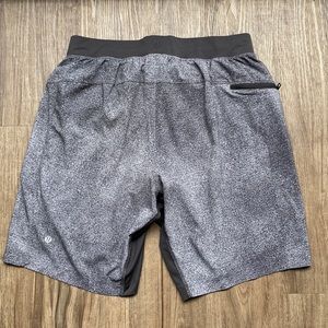 Lululemon Athletica.Men’s shorts. Inseam 9” .Waist 32’. Lined.Gray. Drawstring.